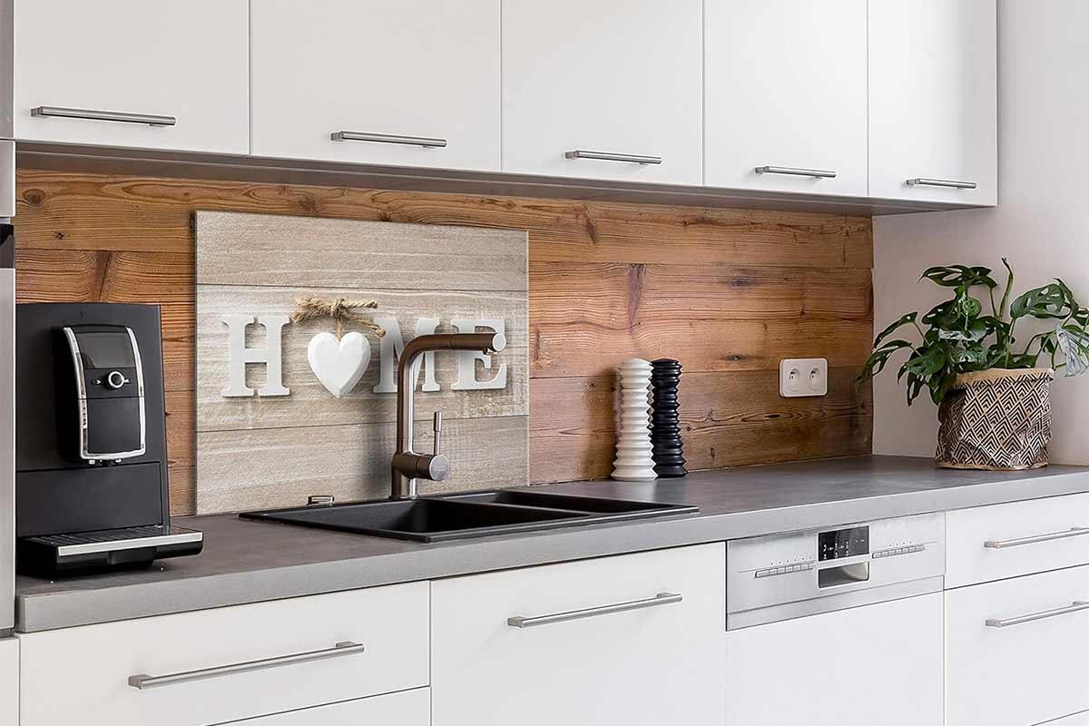 Paraschizzi shabby chic in vetro con scritta home.