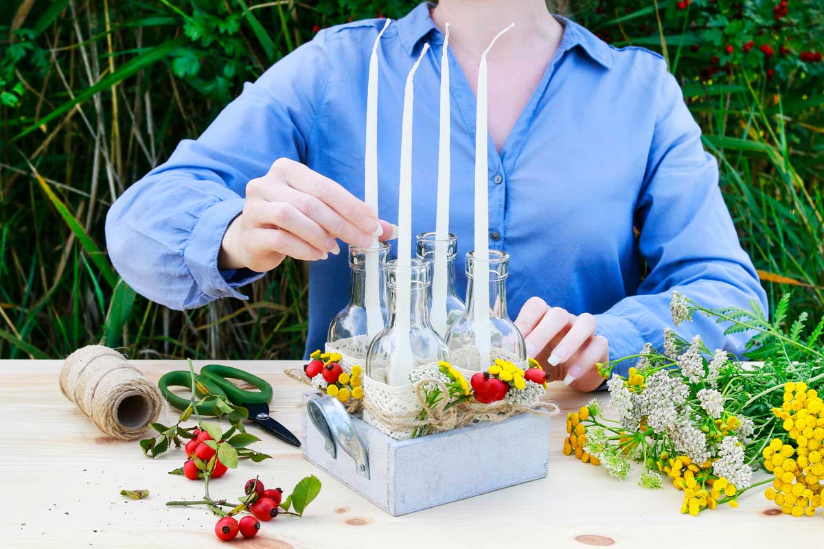 Portacandele fai da te con bottiglie